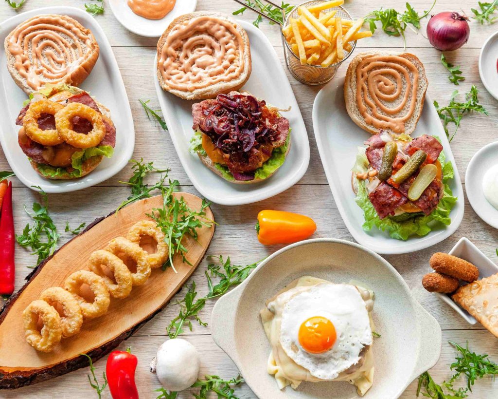 Hambúrguer Moderno em Hamburgueria Estilosa – X Delicioso e Inovador